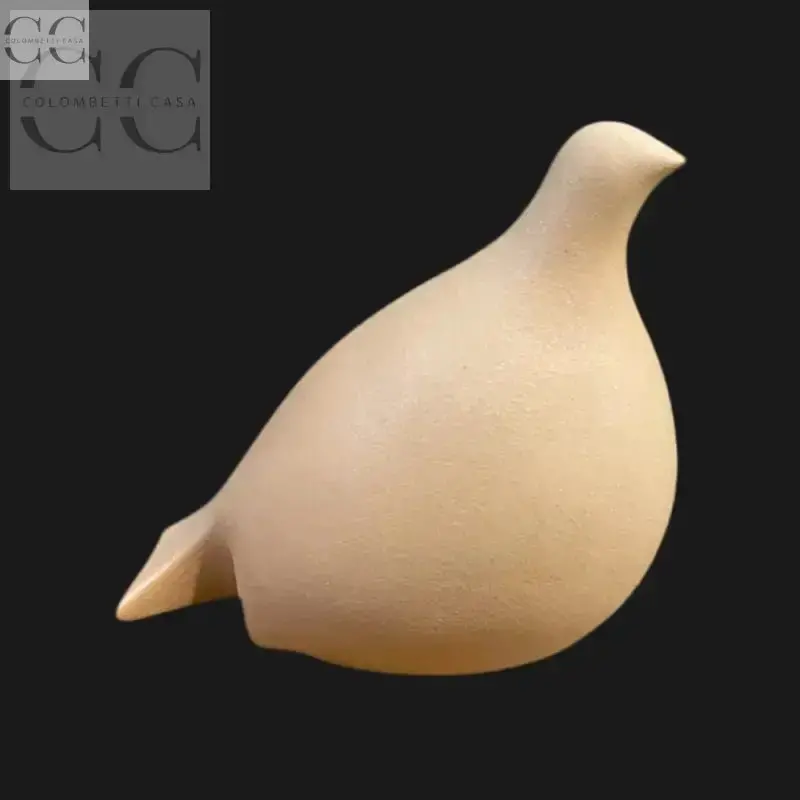 Stylized Apricot-Toned Dove Figurine – Hand-Painted Ceramic 1